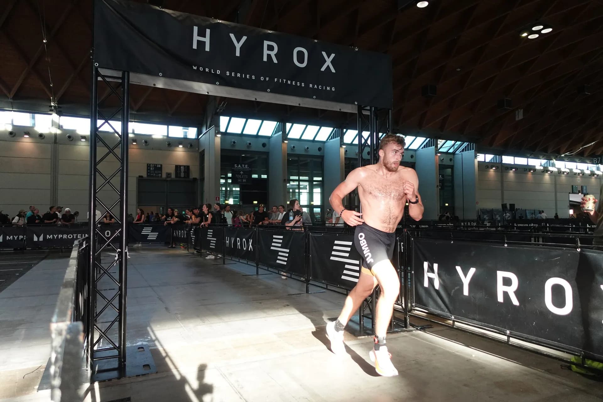 Richard Hynek pacing a run at a HYROX race