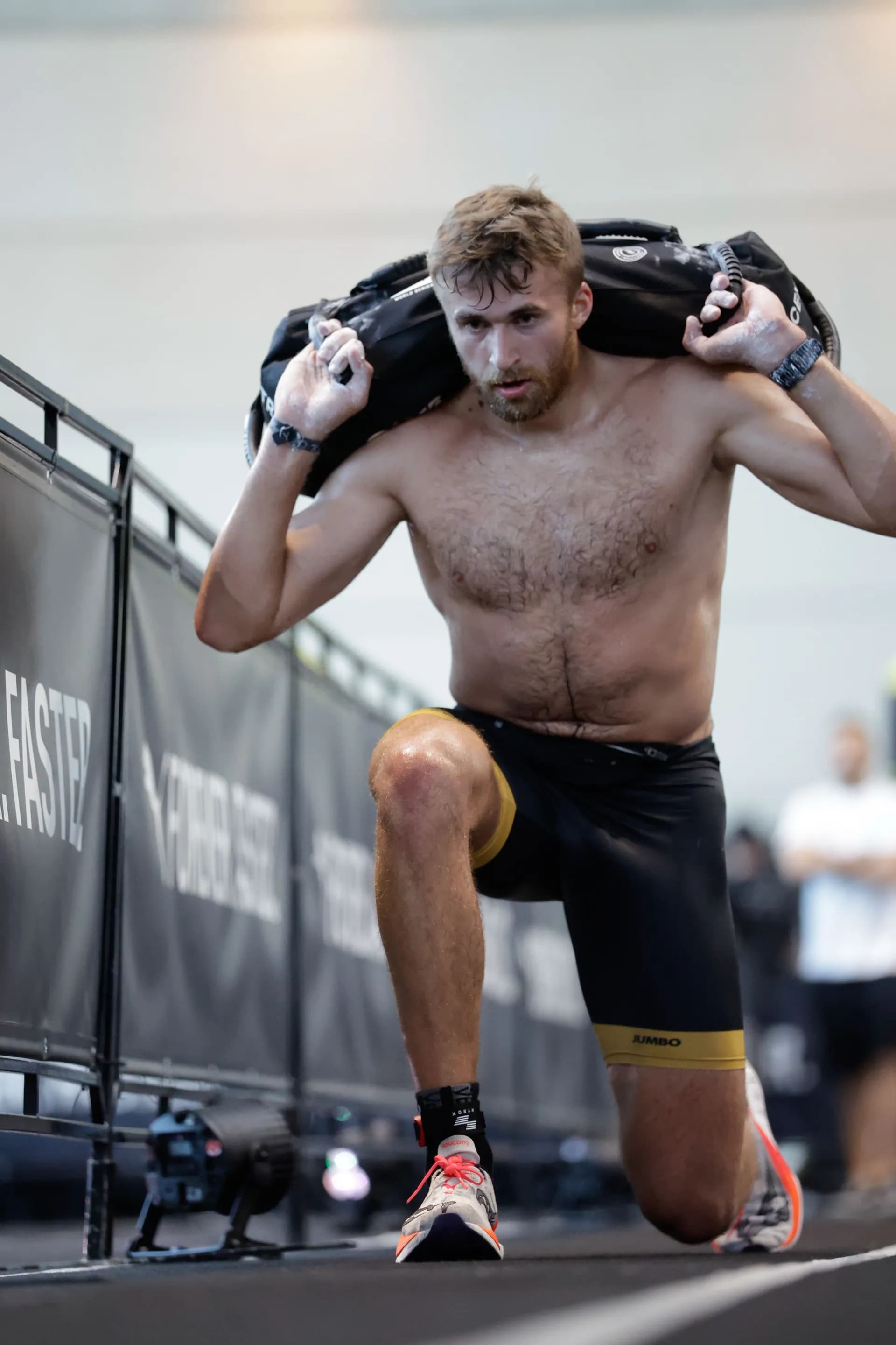 Richard Hynek performing wall balls at a HYROX race